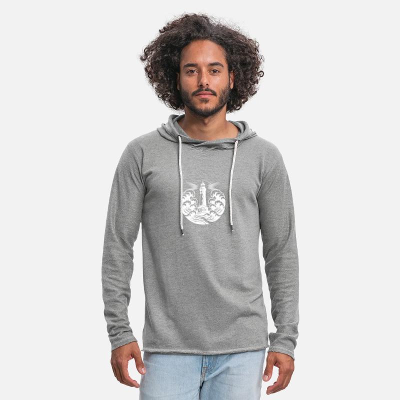 Shining Coastal Lighthouse In Heavy Waves